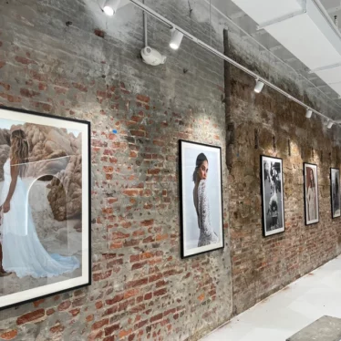 Retail store multi-frame picture hanging