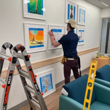 Commercial multi-frame artwork installation in office building